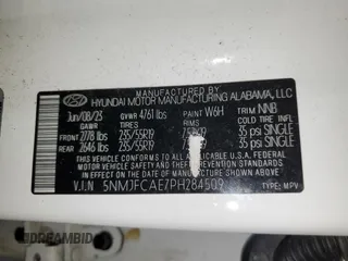 2023 Hyundai Tucson SEL z VIN 5NMJFCAE7PH284509, wystawiony jako Copart lot #60258975 z przebiegiem 52 550 mil mil oraz Szkoda całkowita • Salvage title. Historia ofert i sprzedaży dostępna na DreamBid. Obrazek 13.