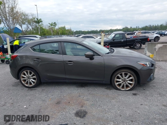 2015 Mazda 3 S Grand Touring with VIN JM1BM1M35F1264244, listed as a IAAI auction lot 41674683 with 119,684 mi miles and . Bid and sale history available at DreamBid. Image 13.