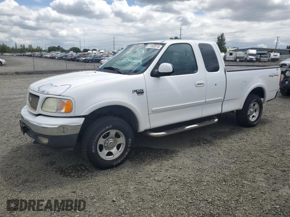 2002 Ford F-150 XL with VIN 1FTRX18L62KC53807, listed as a Copart auction lot 57463075 with 173,301 mi miles and Salvage title. Bid and sale history available at DreamBid. Image 1.