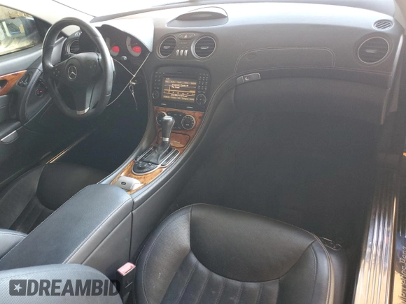 2011 Mercedes-Benz SL 550 z VIN WDBSK7BAXBF165859, wystawiony jako Copart lot #80166084 z przebiegiem 33 119 mil mil oraz Czysty tytuł • Clean title. Historia ofert i sprzedaży dostępna na DreamBid. Obrazek 8.