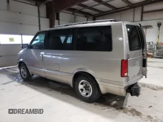 2001 Chevrolet Astro z VIN 1GNEL19W01B143781, wystawiony jako Copart lot #58476275 z przebiegiem 157 888 mil mil oraz Szkoda całkowita • Salvage title. Historia ofert i sprzedaży dostępna na DreamBid. Obrazek 2.