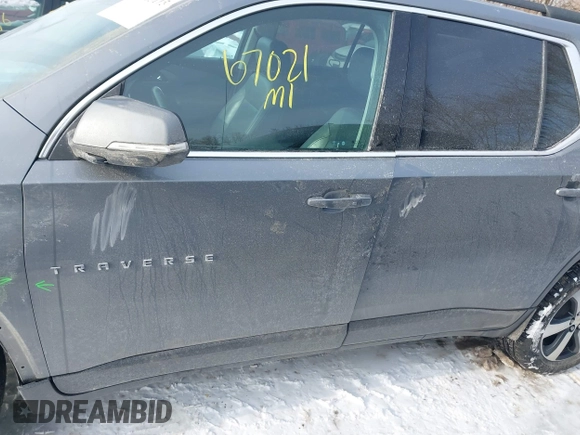 2021 Chevrolet Traverse LT z VIN 1GNERHKW0MJ160463, wystawiony jako IAAI lot #41263115 z przebiegiem 67 021 mil mil oraz . Historia ofert i sprzedaży dostępna na DreamBid. Obrazek 14.