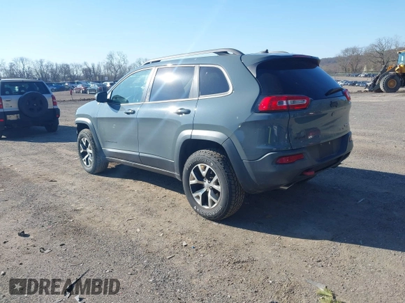 2014 Jeep Cherokee Trailhawk with VIN 1C4PJMBS4EW179763, listed as a IAAI auction lot 41988048 with 152,681 mi miles. Bid and sale history available at carsss.com. Image 3.