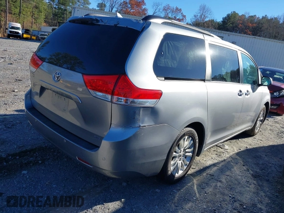 2011 Toyota Sienna XLE AAS with VIN 5TDYK3DC9BS103193, listed as a IAAI auction lot 41073036 with 175,474 mi miles and . Bid and sale history available at DreamBid. Image 4.