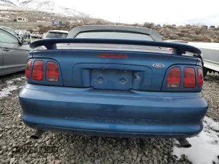 1998 Ford Mustang GT z VIN 1FAFP45X6WF186450, wystawiony jako Copart lot #45398475 z przebiegiem 124 697 mil mil oraz Szkoda całkowita • Salvage title. Historia ofert i sprzedaży dostępna na DreamBid. Obrazek 6.