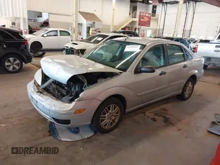 2005 Ford Focus S with VIN 1FAFP34N85W224267, listed as a IAAI auction lot 42349913 with 140,413 mi miles and . Bid and sale history available at DreamBid. Image 18.