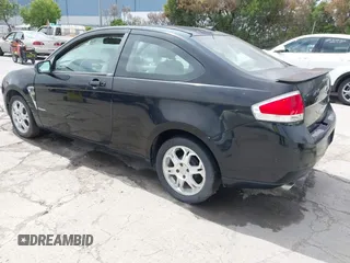 2008 Ford Focus SE with VIN 1FAHP33N38W107114, listed as a IAAI auction lot 42076432 with 124,487 mi miles. Bid and sale history available at carsss.com. Image 3.