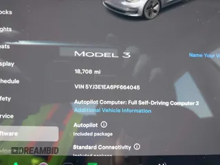 2023 Tesla Model 3 with VIN 5YJ3E1EA6PF664045, listed as a IAAI auction lot 42561039 with 18,708 mi miles and . Bid and sale history available at DreamBid. Image 7.