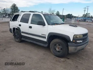 2002 Chevrolet Tahoe LS with VIN 1GNEK13V22R157077, listed as a IAAI auction lot 41402687 with 329,084 mi miles and . Bid and sale history available at DreamBid. Image 1.