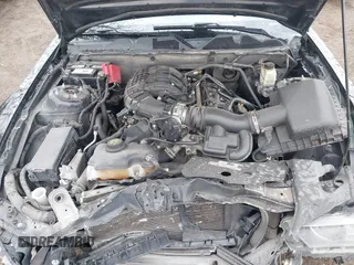 2014 Ford Mustang V6 with VIN 1ZVBP8AM0E5279980, listed as a IAAI auction lot 41943672 with 161,987 mi miles. Bid and sale history available at carsss.com. Image 10.