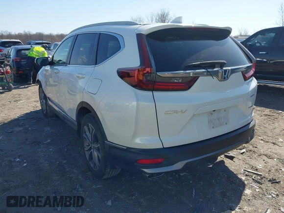 2020 Honda CR-V Touring with VIN 2HKRW2H99LH635892, listed as a IAAI auction lot 41822462 with 41,645 mi miles and . Bid and sale history available at DreamBid. Image 3.
