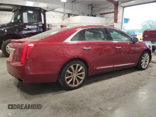 2015 Cadillac XTS Luxury z VIN 2G61M5S39F9189133, wystawiony jako Copart lot #56889185 z przebiegiem 130 927 mil mil oraz Czysty tytuł • Clean title. Historia ofert i sprzedaży dostępna na DreamBid. Obrazek 3.