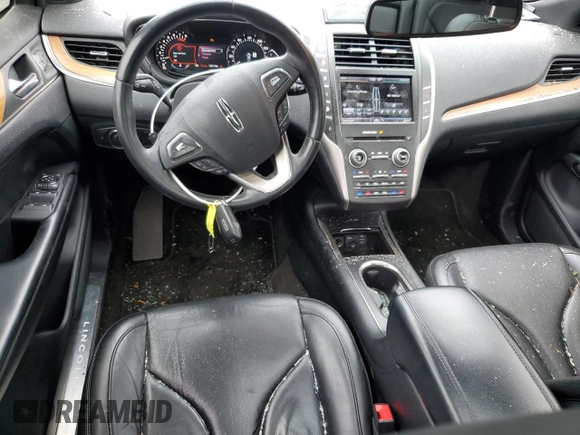 2015 Lincoln MKC z VIN 5LMTJ2AHXFUJ10820, wystawiony jako Copart lot #57139315 z przebiegiem 128 714 mil mil oraz Szkody całkowita. Historia ofert i sprzedaży dostępna na DreamBid. Obrazek 8.