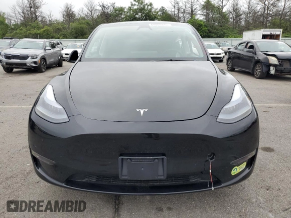 2024 Tesla Model Y Long Range with VIN 7SAYGDEE4RF198027, listed as a Copart auction lot 64008945 with 7,826 mi miles and Salvage title. Bid and sale history available at DreamBid. Image 5.