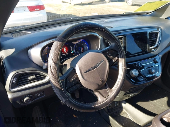 2020 Chrysler Pacifica Launch Edition with VIN 2C4RC3BG1LR123861, listed as a IAAI auction lot 41294790 with 56,007 mi miles and . Bid and sale history available at DreamBid. Image 18.
