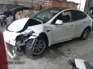 2023 Tesla Model Y Long Range z VIN 7SAYGAEEXPF789037, wystawiony jako IAAI lot #41551605 z przebiegiem 8 630 mil mil oraz . Historia ofert i sprzedaży dostępna na DreamBid. Obrazek 17.