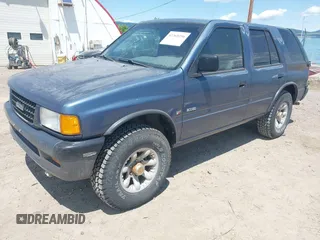 1995 Isuzu Rodeo z VIN 4S2CM58V5S4370553, wystawiony jako IAAI lot #42369256 z przebiegiem 198 946 mil mil oraz . Historia ofert i sprzedaży dostępna na DreamBid. Obrazek 2.