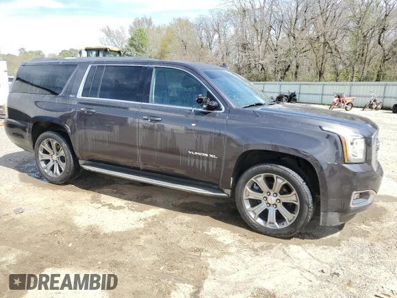 2015 GMC Yukon XL SLT with VIN 1GKS1HKC8FR551491, listed as a Copart auction lot 49183575 with 226,565 mi miles and Salvage Title. Bid and sale history available at carsss.com. Image 4.