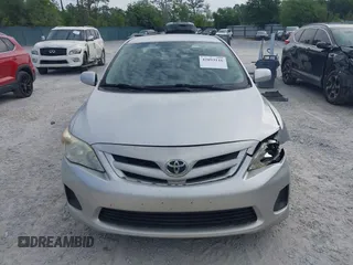 2011 Toyota Corolla L with VIN JTDBU4EE9B9150020, listed as a IAAI auction lot 42093116 with 69,376 mi miles and . Bid and sale history available at DreamBid. Image 12.