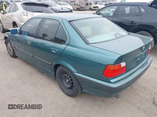 1998 BMW 3 Series 318iA with VIN WBACC0320WEK26338, listed as a IAAI auction lot 41187823 with 145,250 mi miles. Bid and sale history available at carsss.com. Image 3.
