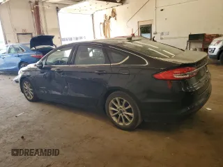 2017 Ford Fusion Hybrid SE z VIN 3FA6P0LU2HR247283, wystawiony jako Copart lot #62571495 z przebiegiem 167 042 mil mil oraz Nie do naprawy • Non repairable. Historia ofert i sprzedaży dostępna na DreamBid. Obrazek 2.