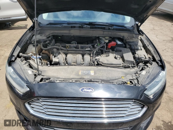 2015 Ford Fusion SE z VIN 3FA6P0H7XFR263179, wystawiony jako Copart lot #58833405 z przebiegiem 194 909 mil mil oraz Czysty tytuł • Clean title. Historia ofert i sprzedaży dostępna na DreamBid. Obrazek 11.