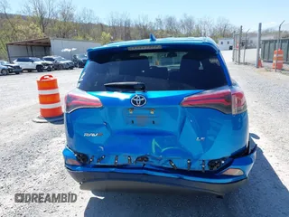 2018 Toyota RAV4 LE with VIN JTMZFREV4JJ734702, listed as a IAAI auction lot 41987540 with 141,526 mi miles. Bid and sale history available at carsss.com. Image 16.
