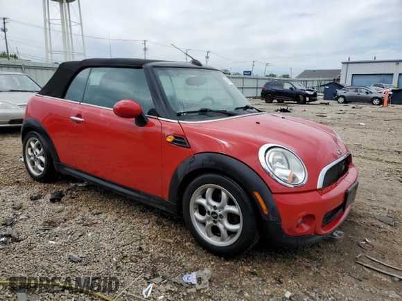 2012 MINI Convertible with VIN WMWZN3C58CT134224, listed as a Copart auction lot 57610015 with 141,394 mi miles and Salvage title. Bid and sale history available at DreamBid. Image 4.