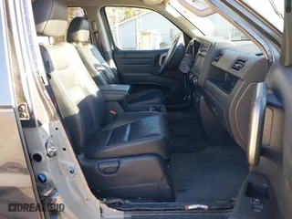 2013 Honda Ridgeline RTL with VIN 5FPYK1F55DB004842, listed as a IAAI auction lot 41843327 with 178,997 mi miles. Bid and sale history available at carsss.com. Image 5.