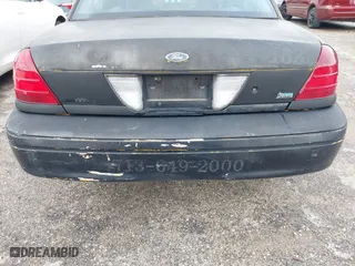 2011 Ford Crown Victoria with VIN 2FABP7AV4BX166216, listed as a IAAI auction lot 41268754 with 205,308 mi miles. Bid and sale history available at carsss.com. Image 20.