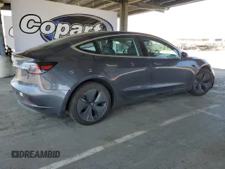 2018 Tesla Model 3 Long Range Battery with VIN 5YJ3E1EA2JF157683, listed as a Copart auction lot 53864165 with 72,736 mi miles and Salvage Title. Bid and sale history available at carsss.com. Image 3.