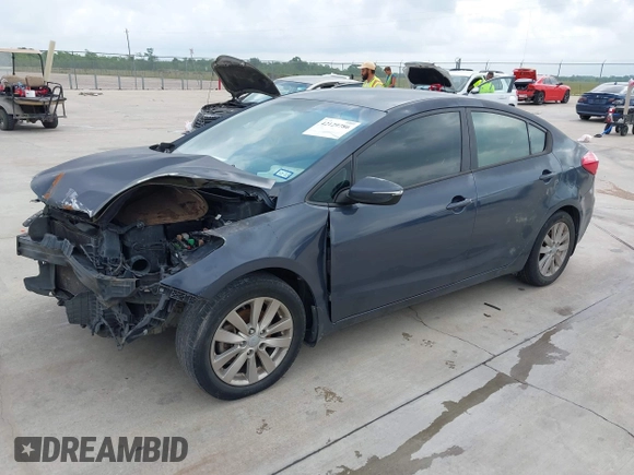 2014 Kia Forte LX with VIN KNAFX4A68E5145665, listed as a IAAI auction lot 42129786 with 192,514 mi miles and . Bid and sale history available at DreamBid. Image 2.