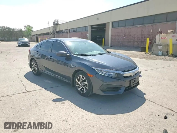 2018 Honda Civic EX с VIN 19XFC2F77JE040070, выставлен на аукционе Copart как лот 56895195 с пробегом 39 746 миль миль и Списание • Salvage title. История ставок и продаж доступна на DreamBid. Изображение 13.