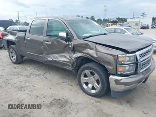 2014 Chevrolet Silverado 1500 LTZ with VIN 3GCUKSEC3EG332480, listed as a IAAI auction lot 40925596 with 205,823 mi miles and . Bid and sale history available at DreamBid. Image 1.