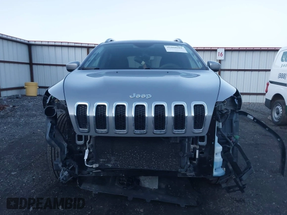 2014 Jeep Cherokee Latitude with VIN 1C4PJMCSXEW220556, listed as a IAAI auction lot 41060501 with 70,152 mi miles and . Bid and sale history available at carsss.com. Image 12.