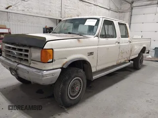 1991 Ford F-350 with VIN 2FTJW36M6MCA54545, listed as a IAAI auction lot 42103955 with 70,602 mi miles and . Bid and sale history available at DreamBid. Image 2.