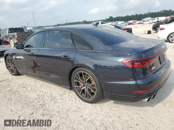 2020 Audi S8 z VIN WAU8SAF82LN003857, wystawiony jako Copart lot #56081794 z przebiegiem 11 298 mil mil oraz Szkody całkowita. Historia ofert i sprzedaży dostępna na DreamBid. Obrazek 2.
