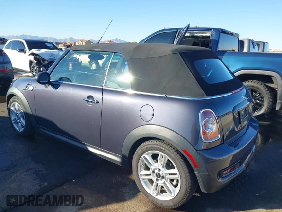 2012 MINI Convertible S with VIN WMWZP3C53CT550336, listed as a IAAI auction lot 40857283 with 51,111 mi miles and . Bid and sale history available at DreamBid. Image 3.