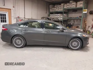 2016 Ford Fusion Titanium with VIN 3FA6P0K92GR370044, listed as a IAAI auction lot 42200799 with 95,574 mi miles and . Bid and sale history available at carsss.com. Image 14.