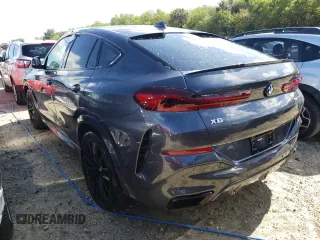 2022 BMW X6 M50i z VIN 5UXCY8C04N9K18587, wystawiony jako Copart lot #62977162 z przebiegiem Nie podano mil oraz . Historia ofert i sprzedaży dostępna na DreamBid. Obrazek 3.