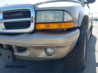 2003 Dodge Durango SLT z VIN 1D4HS48N43F517701, wystawiony jako IAAI lot #42277135 z przebiegiem 135 521 mil mil oraz . Historia ofert i sprzedaży dostępna na DreamBid. Obrazek 6.