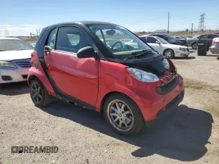 2009 Smart fortwo Pure z VIN WMEEJ31X39K233387, wystawiony jako Copart lot #46931285 z przebiegiem 79 695 mil mil oraz Tytuł czysty. Historia ofert i sprzedaży dostępna na DreamBid. Obrazek 4.