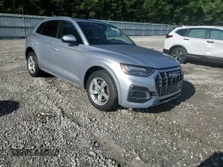 2023 Audi Q5 Premium с VIN WA1ABAFY2P2048917, выставлен на аукционе Copart как лот 56557675 с пробегом 59 113 миль миль и Списание • Salvage title. История ставок и продаж доступна на DreamBid. Изображение 14.