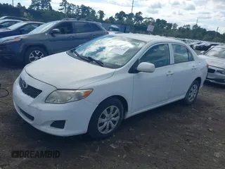 2009 Toyota Corolla with VIN JTDBL40E199019510, listed as a IAAI auction lot 40471286 with 99,818 mi miles and . Bid and sale history available at carsss.com. Image 2.