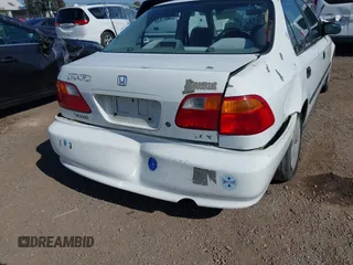 2000 Honda Civic LX with VIN 2HGEJ6673YH502410, listed as a IAAI auction lot 41992745 with 173,958 mi miles. Bid and sale history available at carsss.com. Image 6.