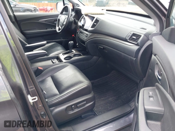2016 Honda Pilot EX-L with VIN 5FNYF6H51GB097337, listed as a IAAI auction lot 42173415 with 145,415 mi miles. Bid and sale history available at carsss.com. Image 5.