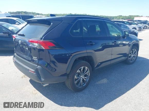 2023 Toyota RAV4 Hybrid XLE Premium with VIN JTMB6RFV4PD098886, listed as a IAAI auction lot 42112706 with 47,743 mi miles and . Bid and sale history available at DreamBid. Image 4.