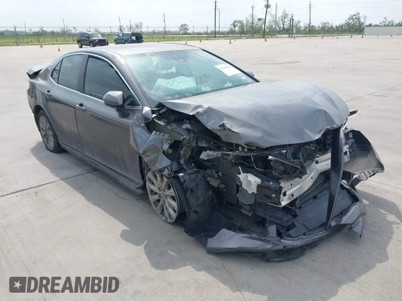 2020 Toyota Camry LE with VIN 4T1C11AK1LU505201, listed as a IAAI auction lot 42006393 with 106,526 mi miles and . Bid and sale history available at carsss.com. Image 1.