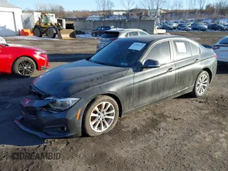 2018 BMW 3 Series 320i xDrive with VIN WBA8E5G57JNU47770, listed as a IAAI auction lot 41409122 with 62,198 mi miles. Bid and sale history available at carsss.com. Image 2.