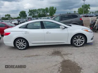 2016 Hyundai Azera Limited z VIN KMHFH4JG6GA547389, wystawiony jako IAAI lot #42374403 z przebiegiem 164 843 mil mil oraz . Historia ofert i sprzedaży dostępna na DreamBid. Obrazek 13.